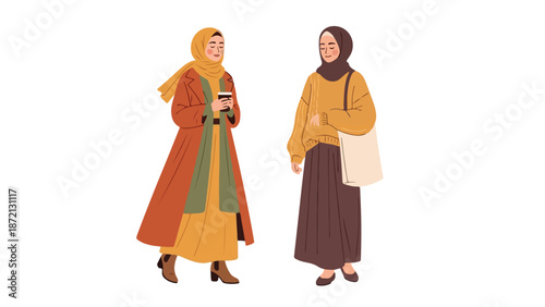 Two women wearing headscarves and casual clothing standing side by side against a plain white background.