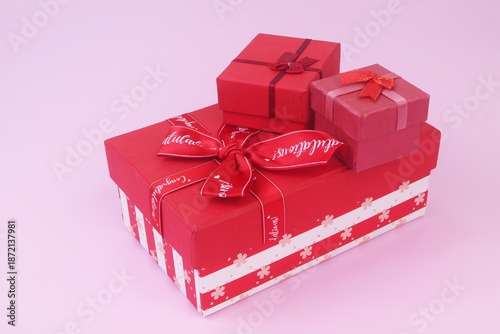 Фотография Gift boxes on pink background. Birthday and resent concept.