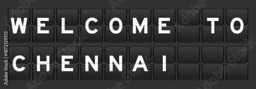 Black color analog flip board with word welcome to chennai on gray background