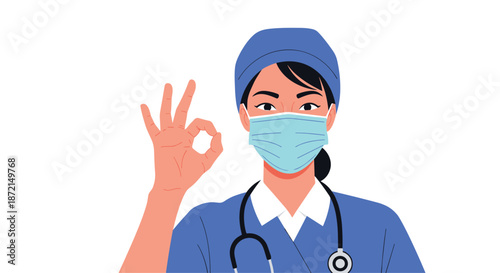 Professional female nurse or doctor wearing a blue medical scrub and a face mask making an okay hand gesture.