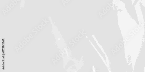 Abstract gray and white brush strokes creating a textured background effect