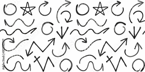An assortment of hand drawn symbols lines and shapes on a white background