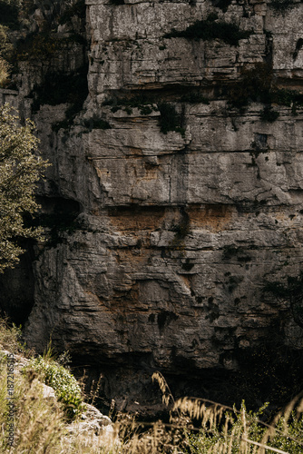 Gole Della Stretta Canyon Near Syracuse In Sicily: Dramatic Limestone Cliffs, Deep Rock Formations, And Mediterranean Vegetation In Rugged Natural Landscape