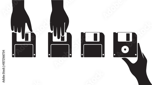 Hands Transferring Floppy Disks