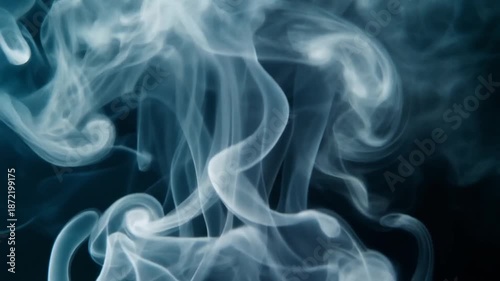 Abstract beautiful white smoke moves slowly on a black background. Smooth flowing vapor rising effect loopable asset for VFX and overlays.