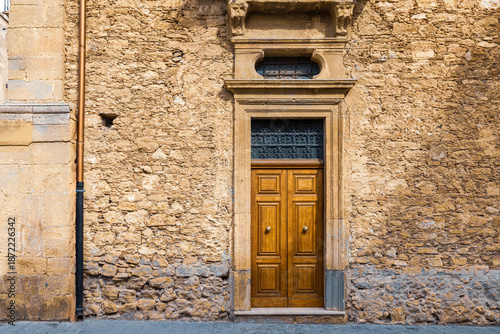 Old Wooden Door in Stone Wall