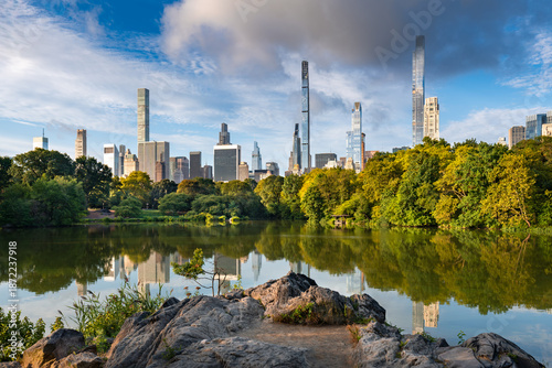 Photography New York City Central Park lake reflecting Billionaires Row skyscrapers in morning light