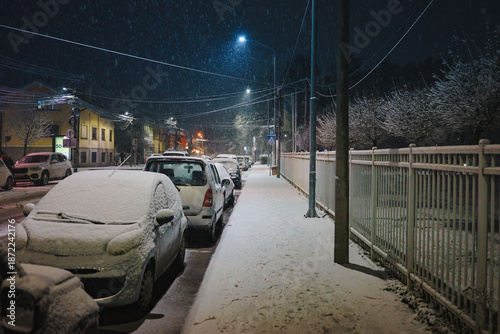 The streets of the city of Cacak while the first snow falls