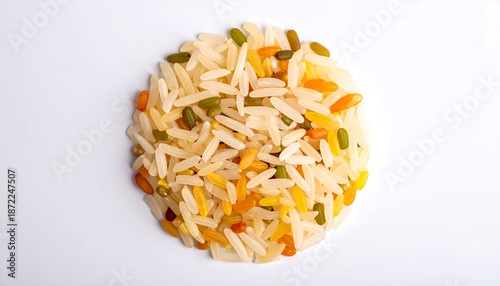 Overhead shot of colorful rice pilaf on a white background.