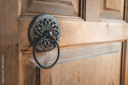 old historical wooden door and metal knocker