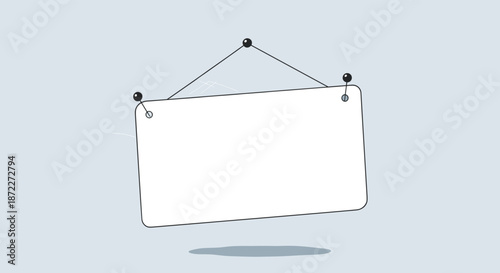 Simple blank white sign with rounded corners hanging by a string from push pins against a plain light blue background.