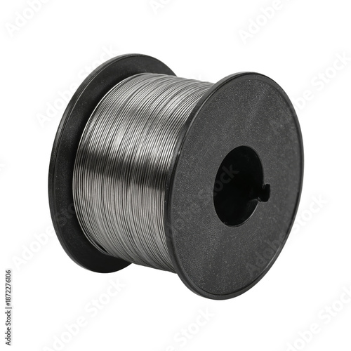 Metal Wire Spool Used for Various Projects in Workshop Settings on a Wooden T...