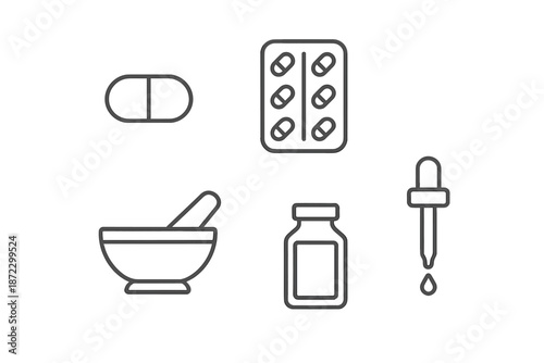 Medical supplies and tools arranged on a flat surface for preparation and dispensing of medicine at a pharmacy or clinic