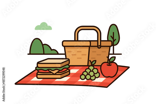 Enjoying lunch with a picnic basket and various food items on a checkered blanket in a green outdoor setting