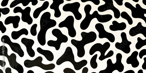 Abstract black and white pattern featuring irregular organic shapes and blotches