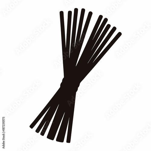 Silhouette of tied together wheat stalks or raw spaghetti noodles