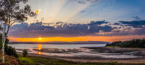 Sunset over the Annapolis Basin off the Bay of Fundy from Smiths Cove in the Digby area on the northwestern shore of Nova Scotia Canada