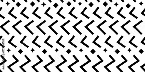 Black and white geometric pattern featuring chevron and diamond shapes