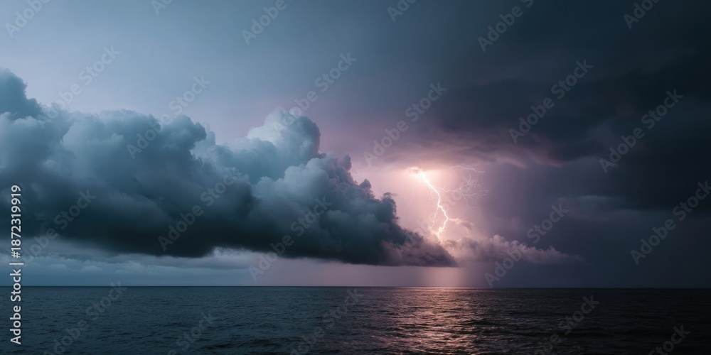 Fototapeta premium Dramatic lightning bolt illuminates dark storm clouds over ocean horizon