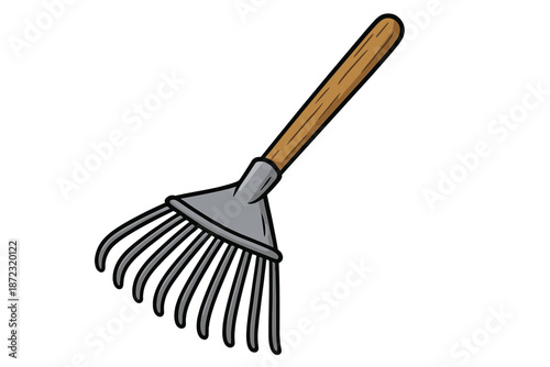 Rake with a wooden handle resting on a surface, used for gardening tasks and yard clean-up