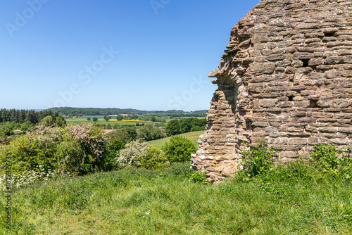 The ruins of the 12th century motte and bailey castle in the village of Kilpeck, Herefordshire, England UK