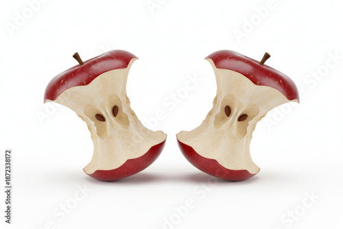 Two Apple Cores on Display: A close-up showcases two remnants of a red apple, artfully arranged, presenting the essence of what remains after indulgence. 