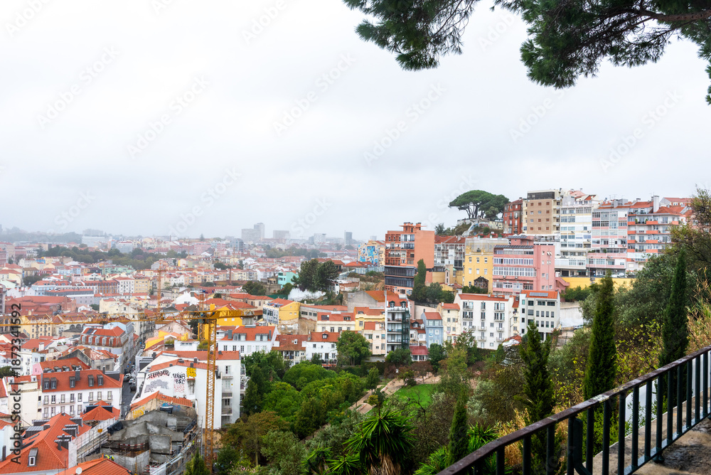 Fototapeta premium Colorful hillside view over historic Lisbon rooftops