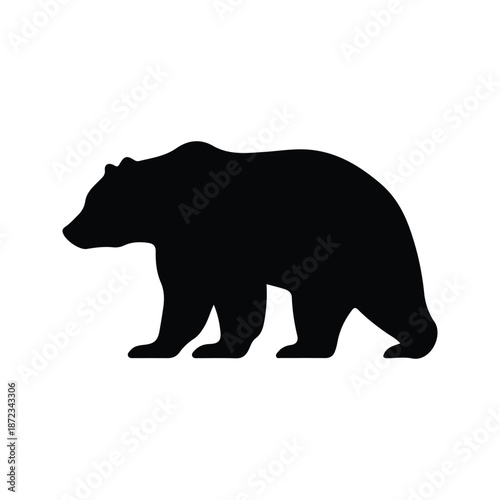 Bold and graphic black silhouette of a majestic bear walking in profile, symbolizing strength, nature, and wilderness, a versatile design element for various projects and themes