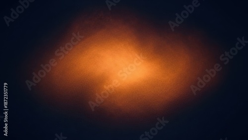 Vibrant orange glow in dark space