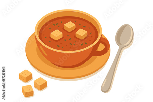 Bowl of soup with croutons served on a plate with a spoon beside it at a kitchen table