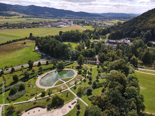 Aerial view of the town of Velké Losiny in the foothills of the Jeseníky Mountains. Drone view of Velké Losiny Castle and the castle garden.