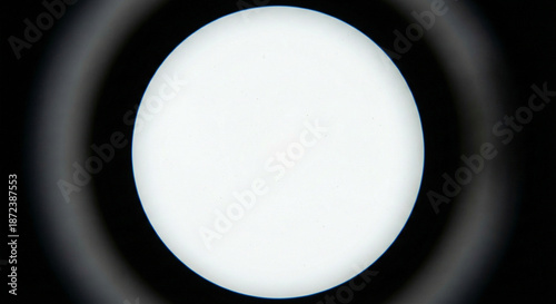 Schilderij op canvas View Through Telescope or Microscope Circle on Black Background