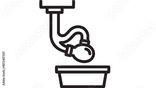 Water flowing from a pipe into a container