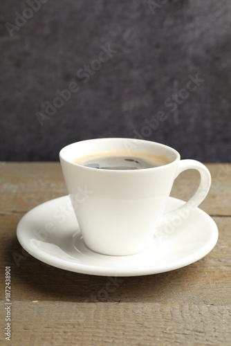 Wallpaper Mural Cup of aromatic coffee on wooden table Torontodigital.ca