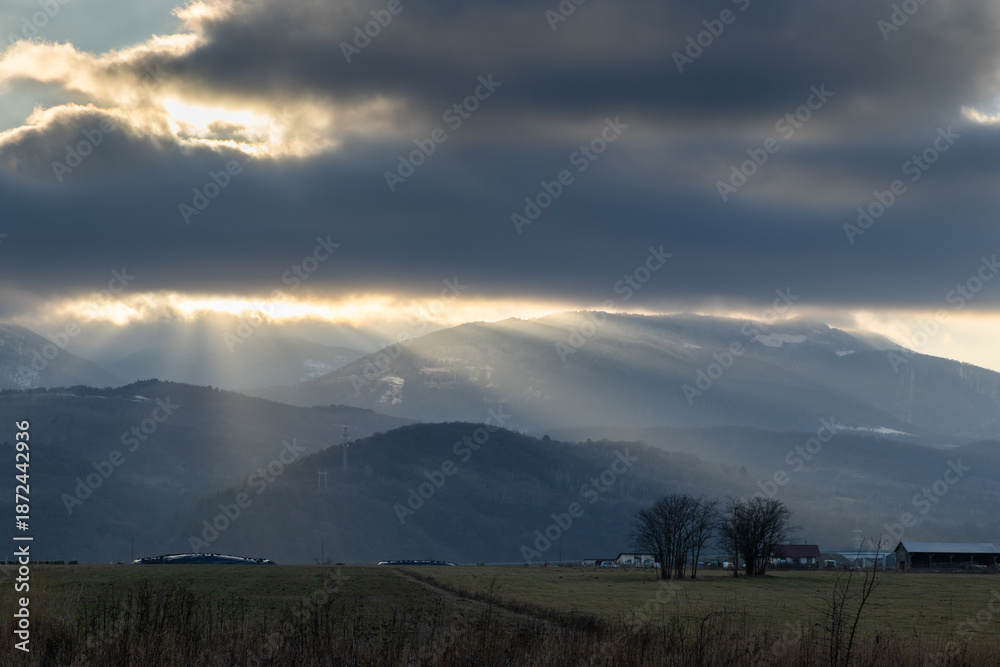 Obraz premium road to snowy mountain range in the winter