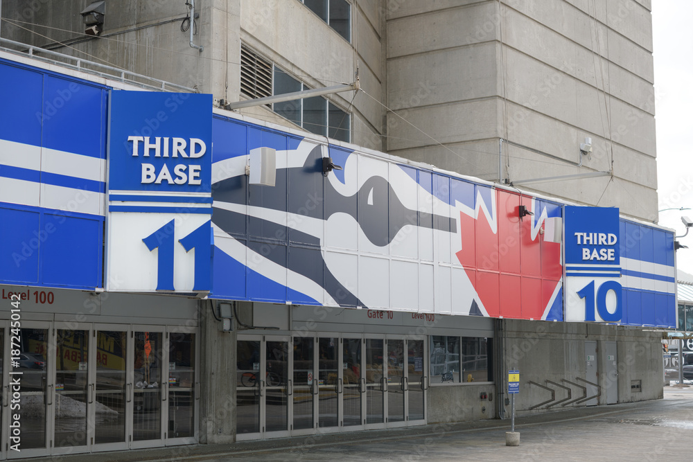 Obraz premium Gates 10 and 11 at Rogers Centre, on the third‑base (west) side of the stadium, closest to the Blue Jays ticket office area and the west‑side concourse, Toronto