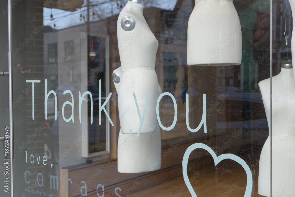 Obraz premium exterior display window with dressmaker forms at the former location of Comrags, a Canadian fashion brand and boutique located at 812 Dundas St W in Toronto’s Trinity‑Bellwoods area