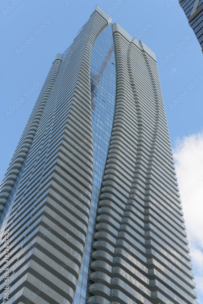 Obraz premium north and west elevation of One Bloor Street East, a 76‑storey mixed‑use residential and retail tower at the southeast corner of Yonge & Bloor in downtown Toronto