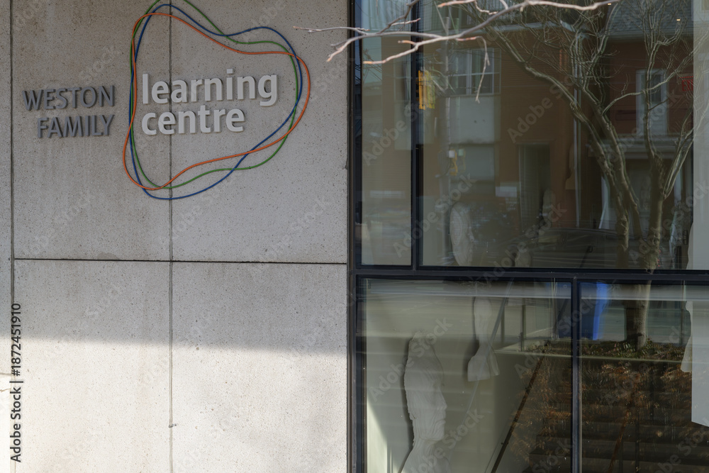 Fototapeta premium Weston Family Learning Centre sign on the west edge of the Art Gallery of Ontario, 317 Dundas St W, Toronto