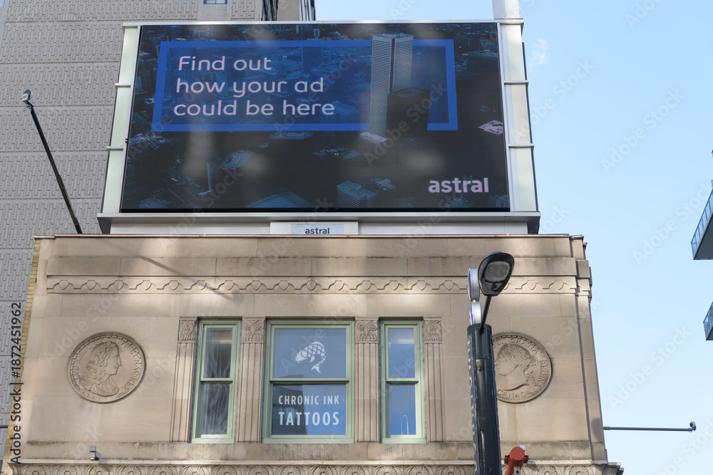 Fototapeta premium Astral media digital billboard on rooftop of 380 Yonge St at Gerrard St W, Toronto