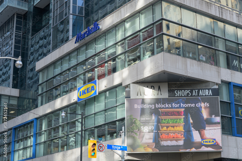 Fototapeta premium exterior building facade and signs including IKEA Toronto Downtown at Aura Concourse Shopping Mall, 382 Yonge St