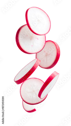 Falling fresh radish slices creating a healthy salad ingredient