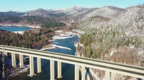 Viaduct Bajer above lake, scenic highway in Gorski Kotar region of Croatia in winter
