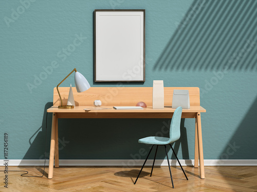 Picture frame in portrait orientation over wooden desk with a lamp and props against blue green plaster wall, 3d render, 3d illustration