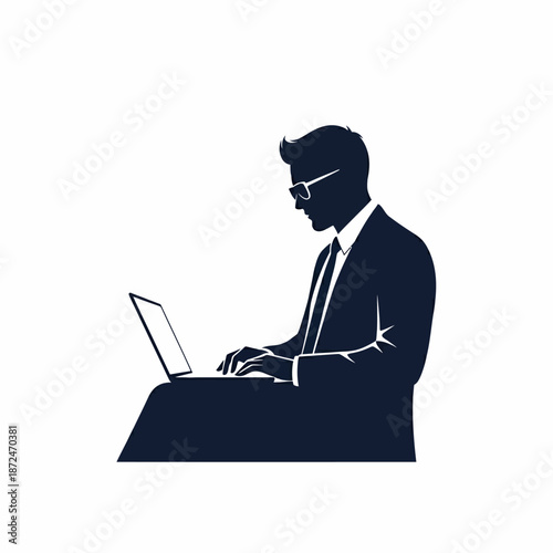 Man in Suit Working on Laptop.