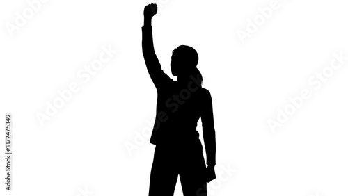 Woman Silhouette Raising Fist in Triumph.