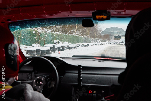 Quadro em tela Inside rally car navigating snowcovered mountain stages with focus