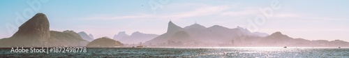 Panel kuchenny z motywem Panoramic Rio de Janeiro seascape with Sugarloaf Mountain and Corcovado silhouette, sparkling Guanabara Bay, pastel morning sky, haze and distant skyline, Brazil