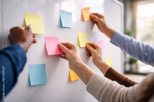 Team brainstorming with colorful sticky notes