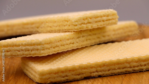 Close-up of three stacked vanilla cream wafers